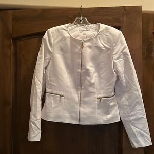Women’s Calvin Klein white jacket with gold zipper details, size 8.